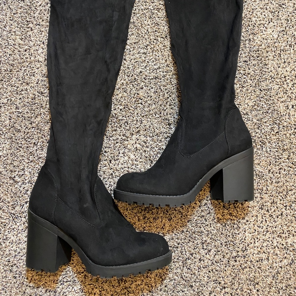 Thigh high boots, over the knee